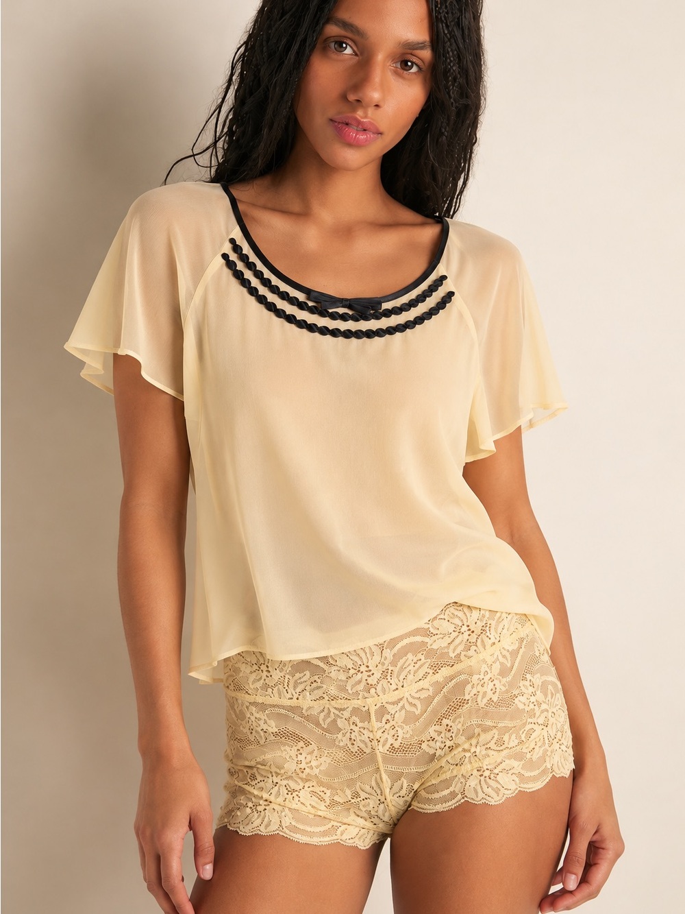 253. Short Sleeve Chiffon Top with Black Trim in butter yellow